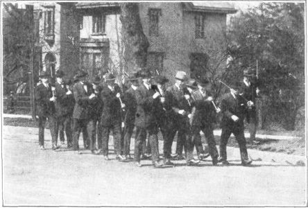 PRACTISING AND MARCHING WITH IRON BARS WEIGHING NINE
POUNDS EACH