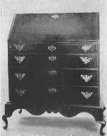 The Hancock desk was a design greatly favored in America
in the eighteenth century. This fine example dates from about 1750.