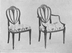 These chairs are reproductions of designs by the Adam
Brothers. They are of satinwood, covered with damask. This design was
also used by Hepplewhite.