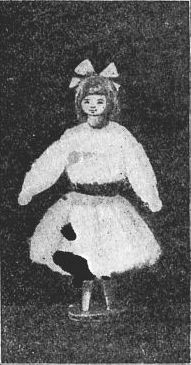 Fig. 114&mdash;Little girl doll made of a clothespin and dressed in raw cotton.