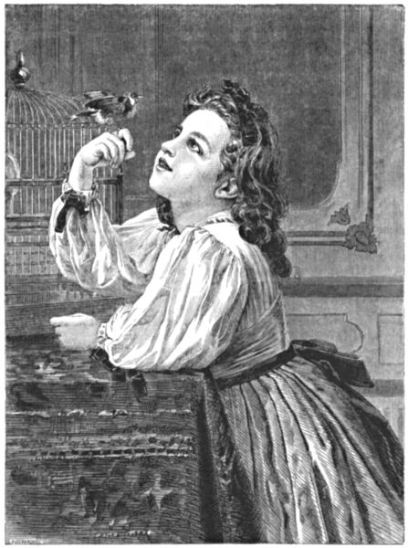 Addie's pet bird perches on her finger