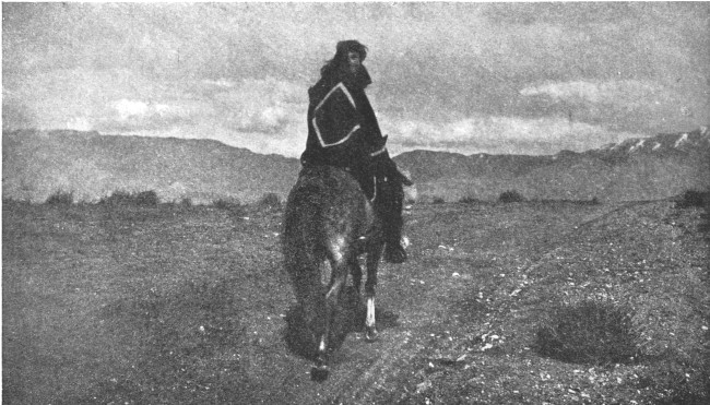 It isn't America at all! It's Arabia, and the Bedouins of
the Painted Desert are Navajo boys