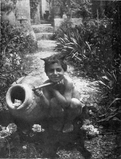 Negative by W. von Gloeden.
“Sprightly little goatherds, whose heads are the heads of Greek fauns.”
(Page 12)