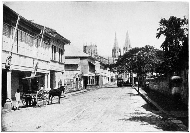 Calzada de San Sebastian. Iron Church in the background “Made in Belgium” and Brought Out in Pieces.