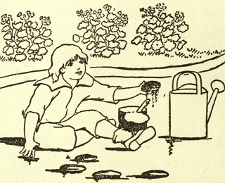 Ned making mud pies in the garden